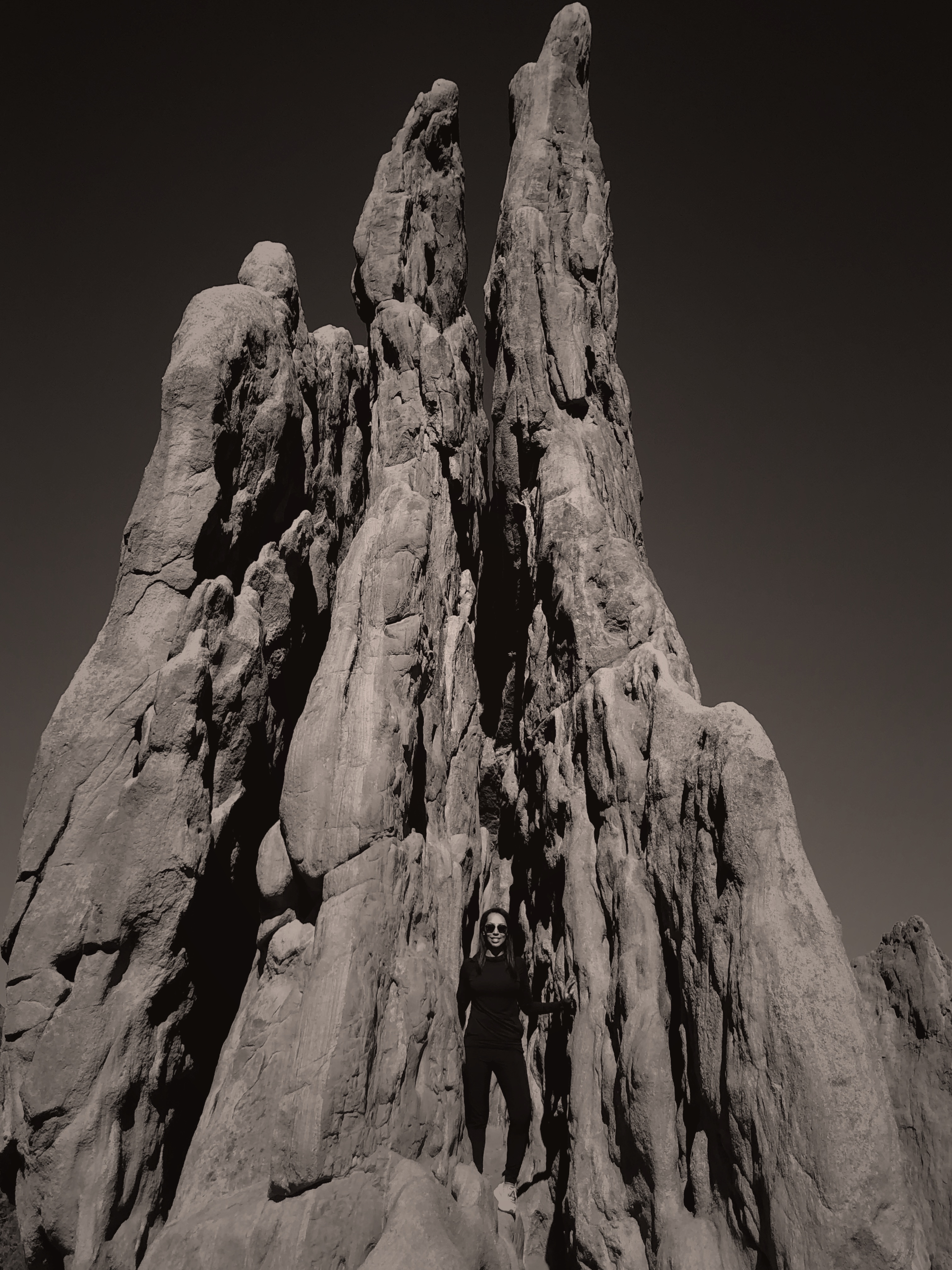 Emily standing among rock formations